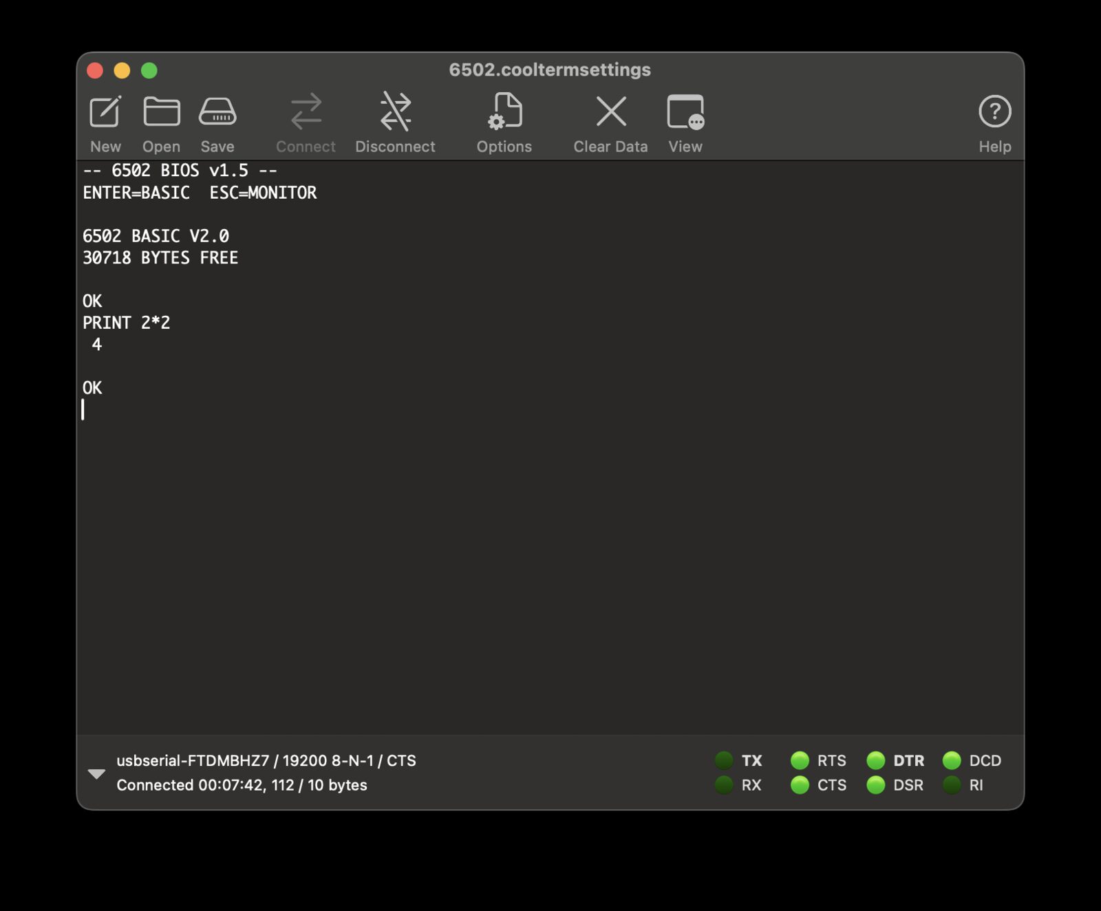 A CoolTerm window connected over serial, showing the BIOS banner, BASIC's own banner, and PRINT 2*2 answered with 4.