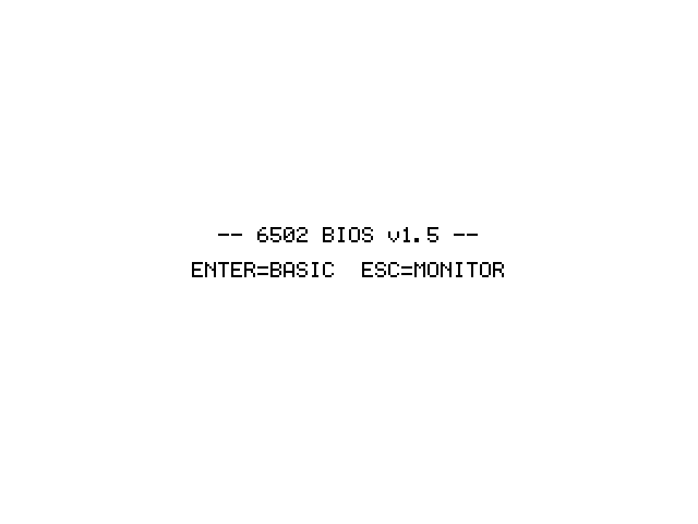 A screen showing two centered lines: dash dash 6502 BIOS v1.5 dash dash, and below it ENTER=BASIC  ESC=MONITOR.